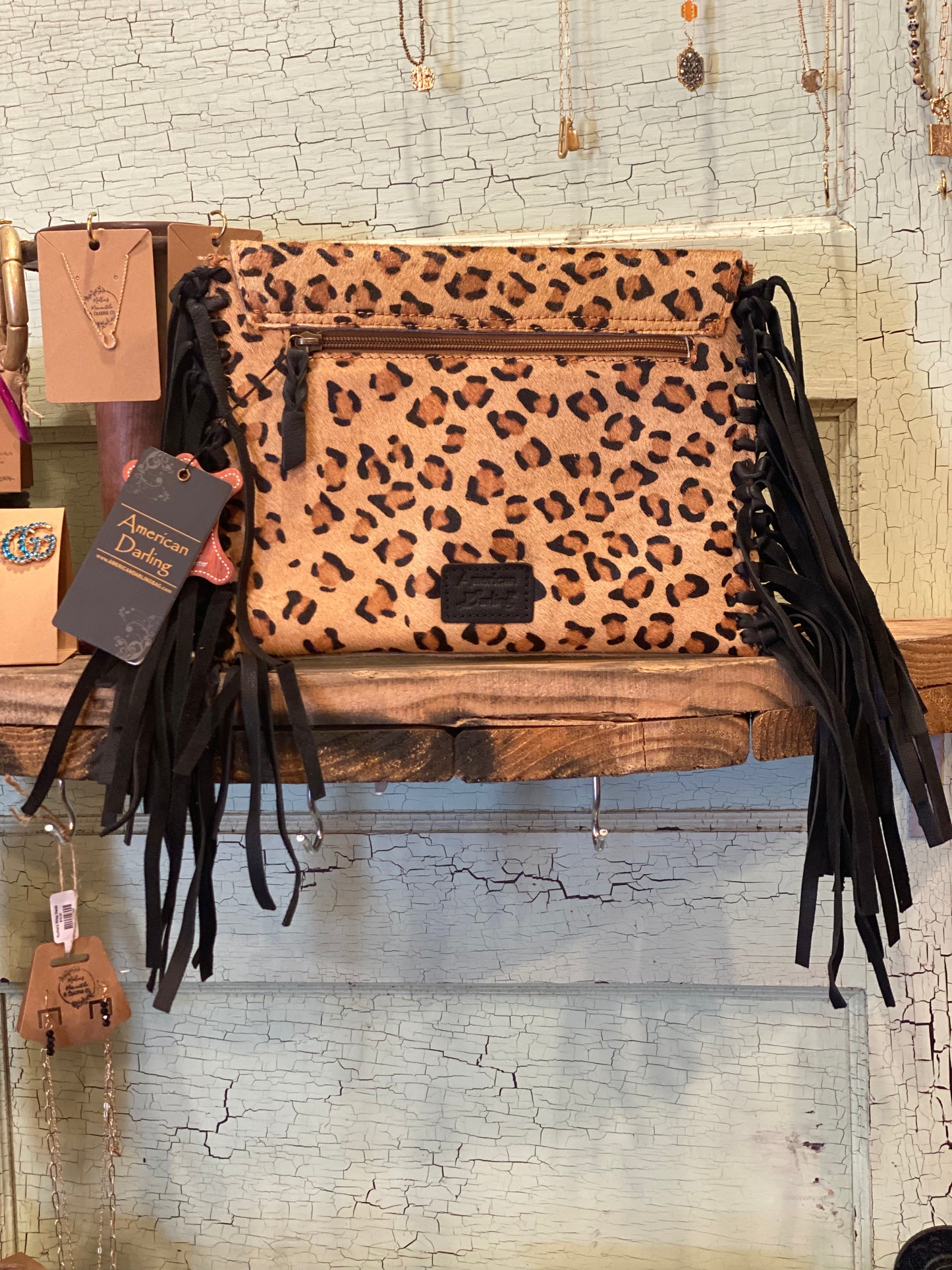 Get it Girl Leopard Cowhide Tassel Clutch