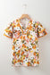 Russet Orange Ruffled V Neck Scalloped Short Sleeve Floral Blouse