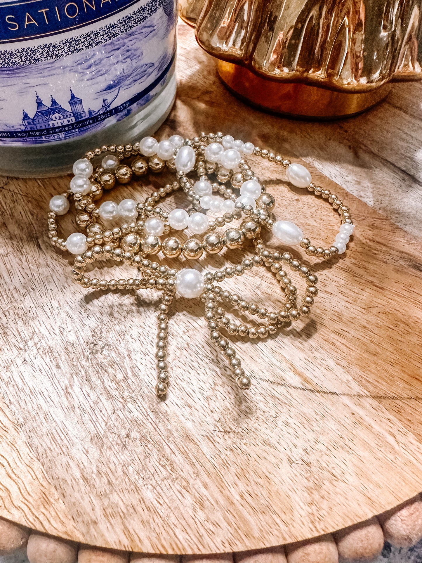 Gold pearl bow bracelet set